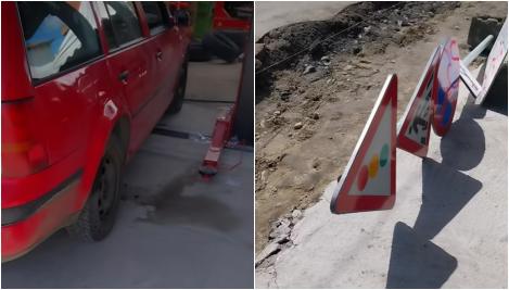Situație neașteptată în Târgu-Jiu! O mașină a rămas blocată în service din cauza lucrărilor de pe stradă | VIDEO