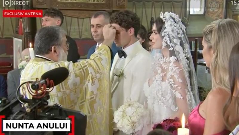 Cum arată rochia de mireasă purtată de Elena Tănase la ceremonia religioasă. Ianis Hagi, chipeș într-un costum elegant