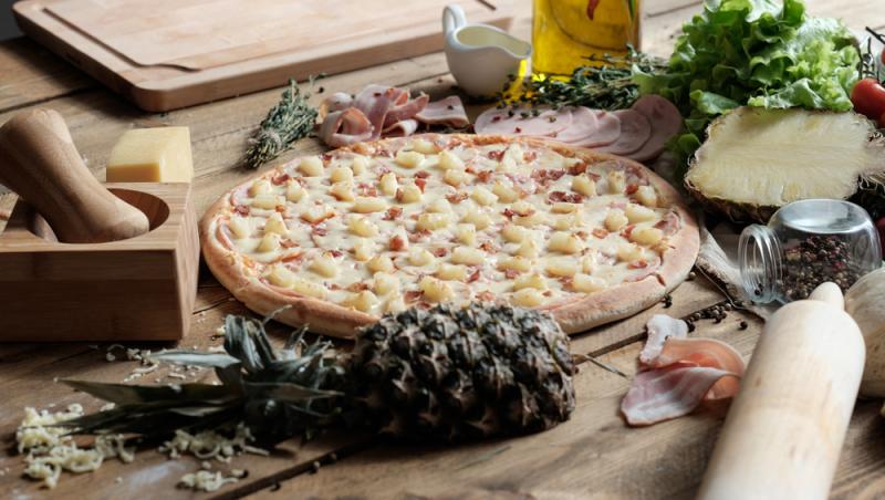 Preț record la o pizza. Cât a ajuns să coste cel mai simplu preparat al italienilor