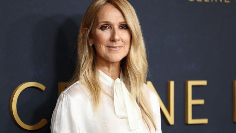 Celine Dion îmbrăcată cu o cămașă albă elegantă