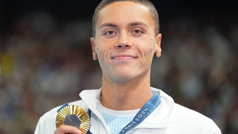 David Popovici, amenințat cu incendierea Porsche-ului de un vecin agresiv. Poliția a decis încătușarea bărbatului