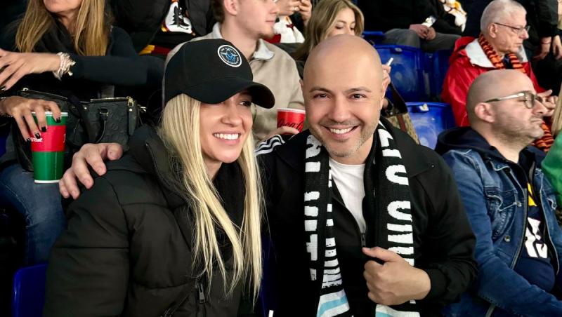 Mihai Mitoșeru alături de o femeie, îmbrăcați casual, participând la un meci