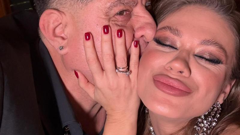 Tavi Colen oferindu-i un sărut pe obraz soției sale