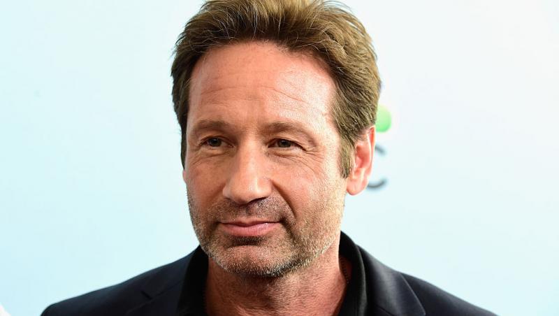 David Duchovny, starul din Dosarele X, s-a căsătorit în secret cu iubita mai tânără cu 33 de ani decât el. Cum arată soția sa