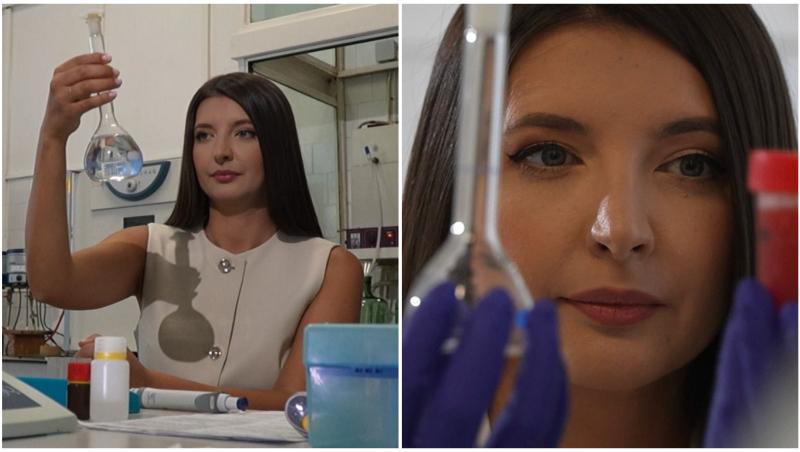 Mădălina Iacob în laborator verifică un recipient cu soluție transparentă