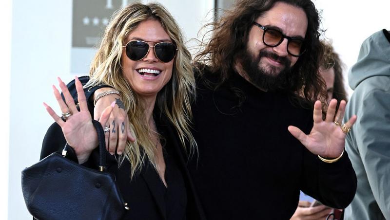 Heidi Klum alături de Tom Kaulitz, ambii îmbrăcați în ținute negre