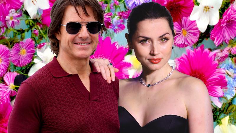 Ana de Armas îmbrăcată într-o rochie neagră decoltată, fără mâneci, pozând alături de Tom Cruise