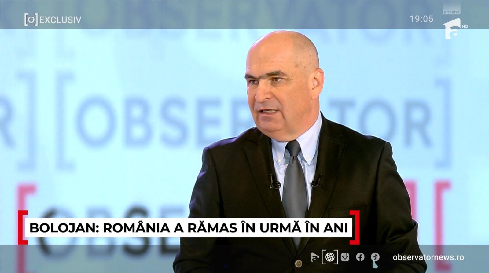 Ilie Bolojan poartă un costum negru