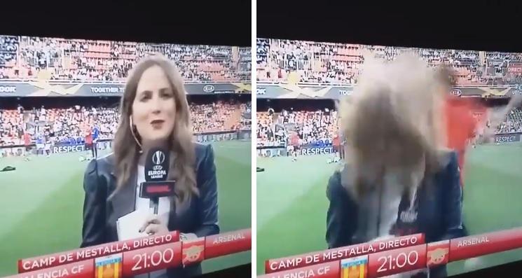 O jurnalistă a fost lovită în cap de o minge, în direct, înainte de meciul Valencia-Arsenal! S-a prăbușit în fața camerei - Video