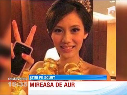 Bijuterie de nevasta: O chinezoaica a purtat cinci kilograme de aur la nunta