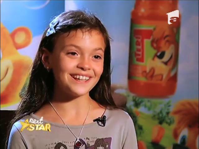 Născută pentru a aduce bucurie în inimile oamenilor! Iuliana, fetiţa adoptată, cântă precum un înger