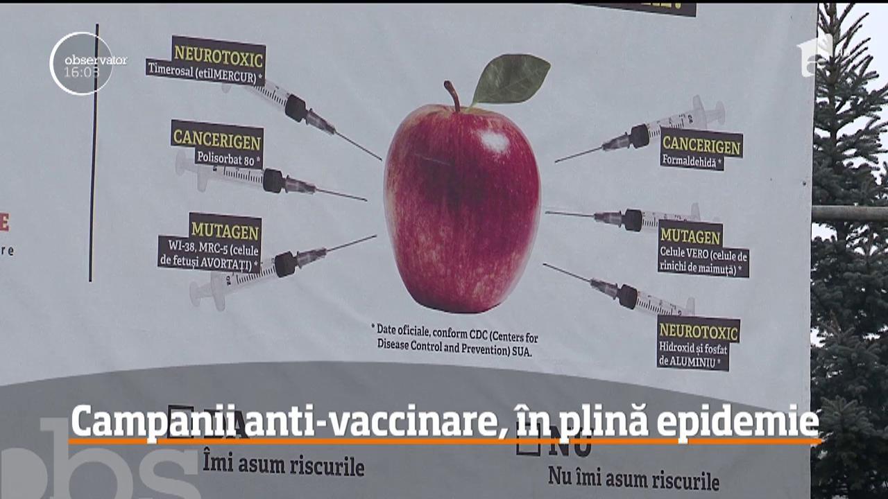 „Tu ai mânca un măr injectat cu ingrediente din vaccinuri?” În plină epidemie de gripă, orașele sunt împânzite de panouri anti-vaccinare
