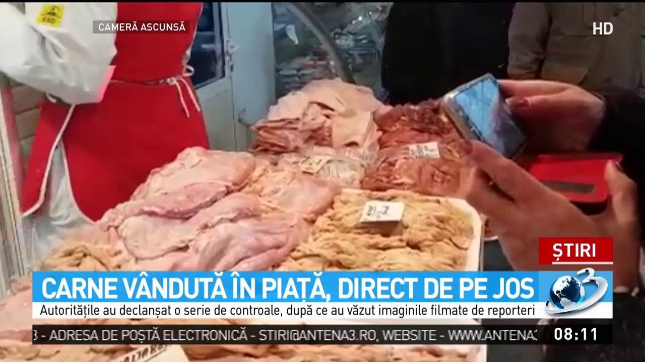 Carne ținută PE JOS și vândută oamenilor, în cea mai mare piață din Capitală! Imagini revoltătoare, filmate cu camera ascunsă
