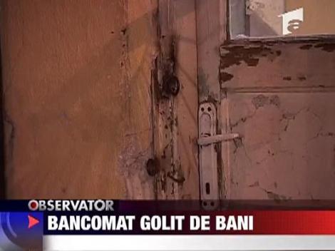 Bancomat, golit de bani
