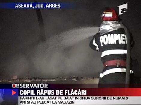 Copil, rapus de flacari