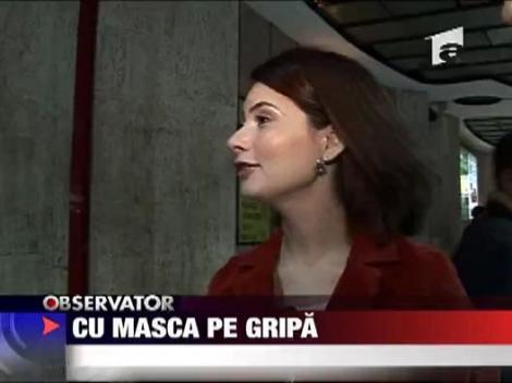 Cu masca pe fata