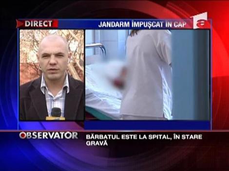 Jandarm impuscat  in cap