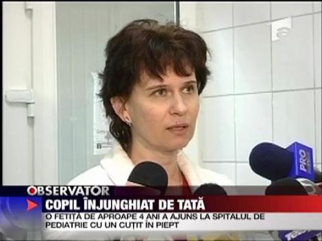 Copil injunghiat de tata