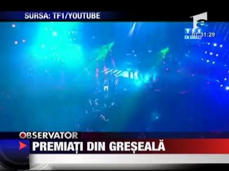 Premiati din greseala