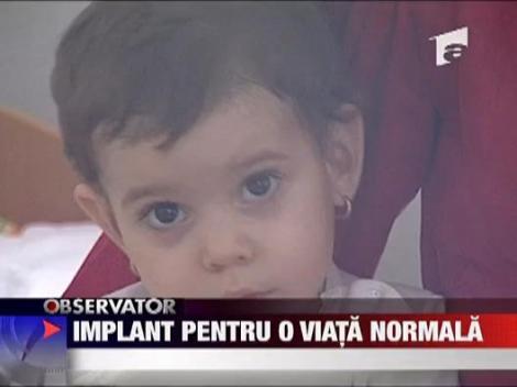 Premiera medicala: implant auditiv pentru un copil