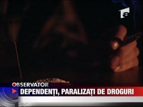 Dependenti, paralizati de droguri