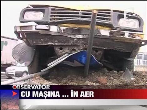 Si-a urcat masina pe sensul giratoriu!