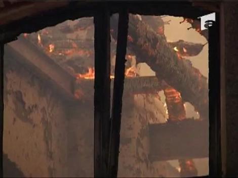 Fabrica de tigari, mistuita de flacari