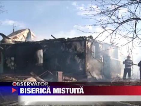 Biserica mistuita de flacari