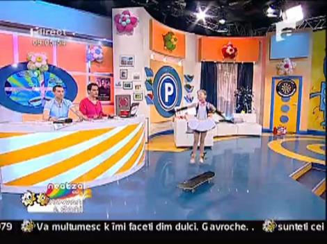 Dans cu skateboard-ul