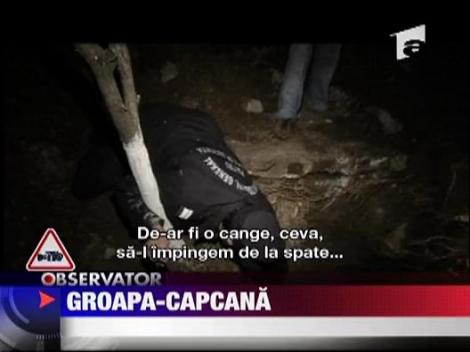 Caine salvat de pompieri