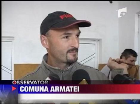 O comuna intreaga s-a imbracat in haine militare