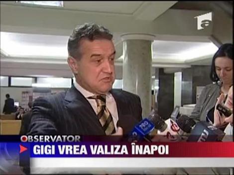 Gigi Becali vrea valiza inapoi