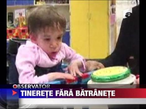 Desi are 17 ani, arata ca un bebelus