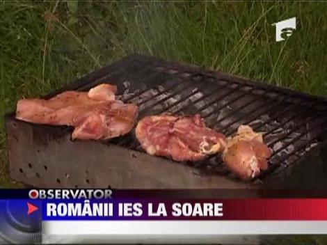 Romanii ies la soare