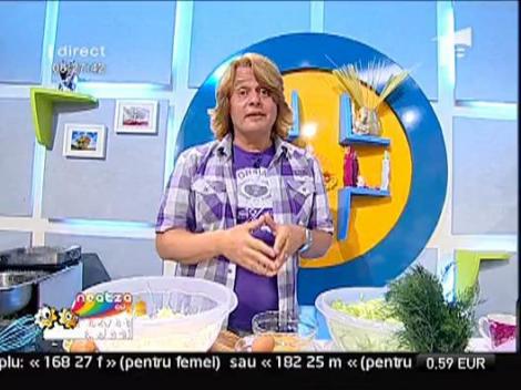 Vladut gateste dovlecei cu branza la cuptor