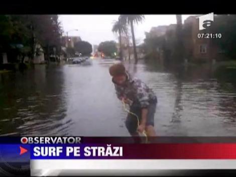 Surf pe strazile inundate