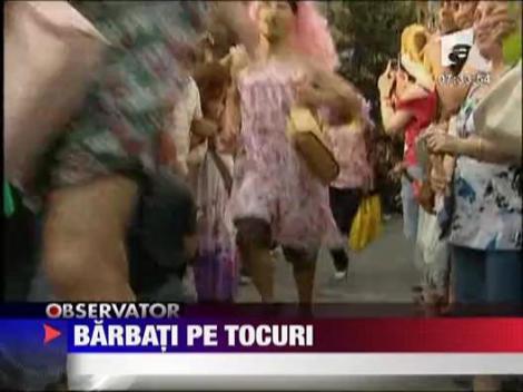 Barbati pe tocuri