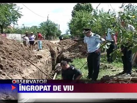 Olt: Un muncitor a murit ingropat de viu