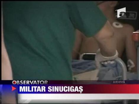 Un militar s-a impuscat in cap