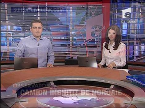 Camion inghitit de noroaie