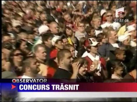 Concurs de mancat aripioare