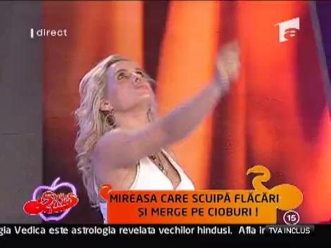 Mireasa care scuipa flacari si merge pe cioburi!