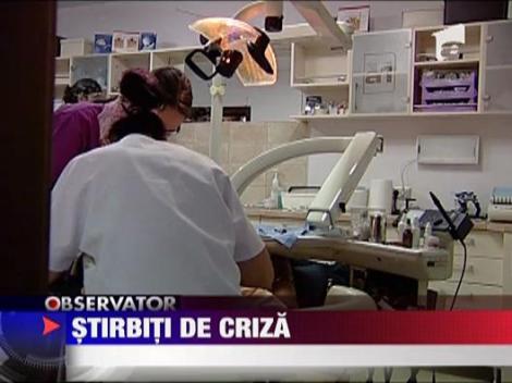 Stirbiti de criza! Romanii ocolesc dentistul
