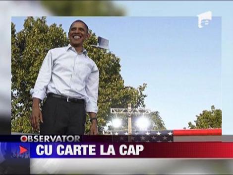 Barack Obama, presedinte cu carte la cap