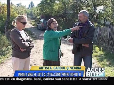 Artista, gardul si vecina