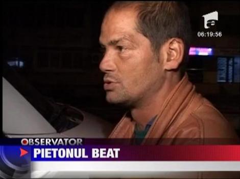 Pieton beat lovit de masina
