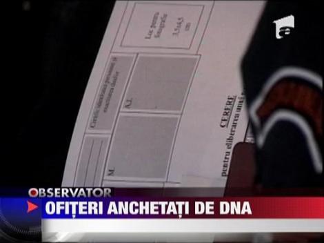 Ofiteri anchetati la DNA