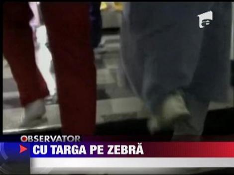 Plimbati cu targa pe strada, pentru a fi operati