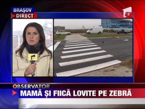 Mama si fiica lovite pe zebra