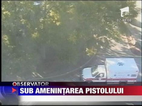 Profesori amenintati cu arma